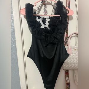 Black puffy shoulders body suit